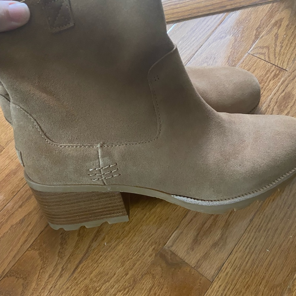 Sorel, tan/brown boots. New without tags.  Can’t go wrong. Goes with everything